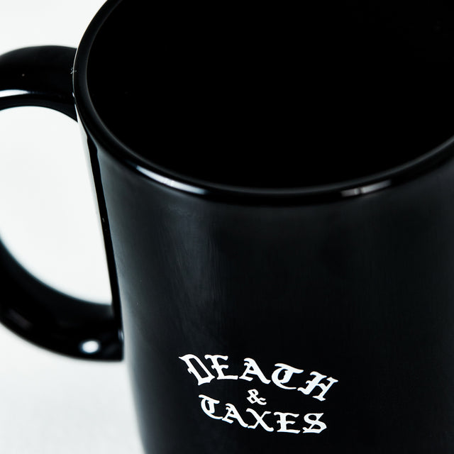 Death & Taxes Kissing Skullies Coffee Mug